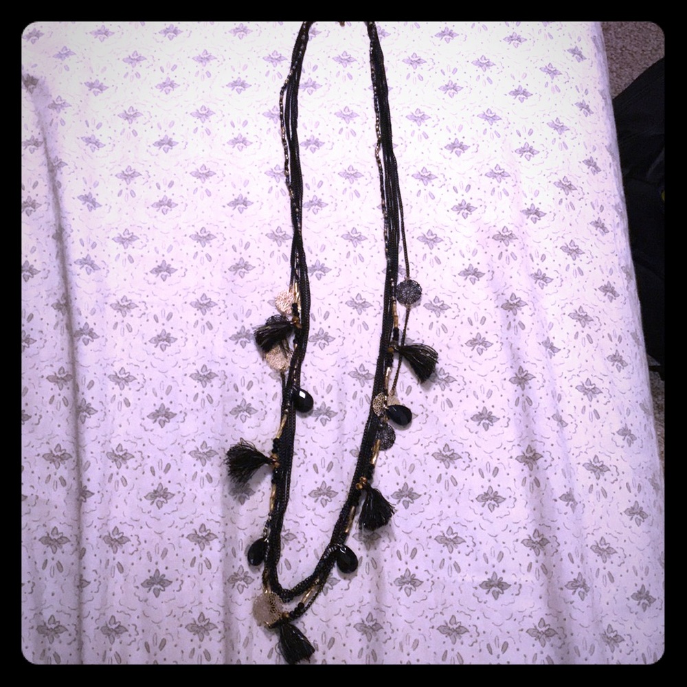 Tassel black and gold long necklace.